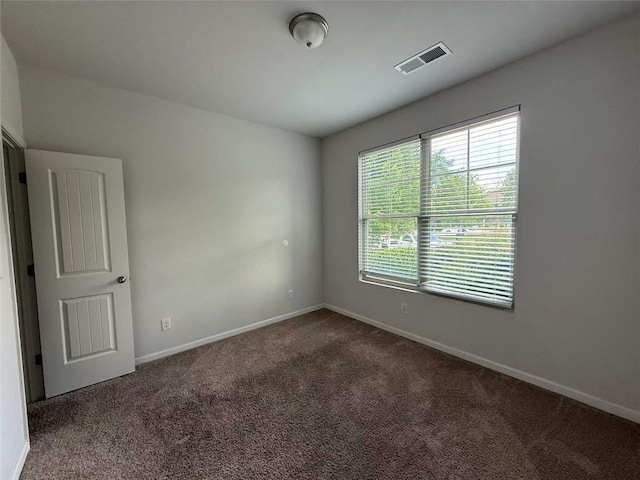 545 Tulip Ln, Mcdonough, GA 30252 - empty room featuring carpet flooring and baseboards