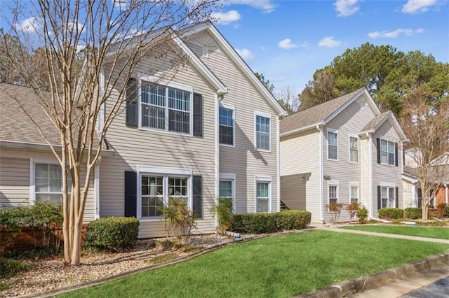 view of front of home with a front yard