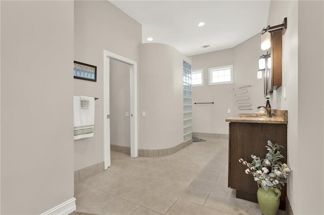 2150 Fincher Rd, Canton, GA 30114 - corridor with baseboards, recessed lighting, light tile patterned floors, visible vents, and a sink