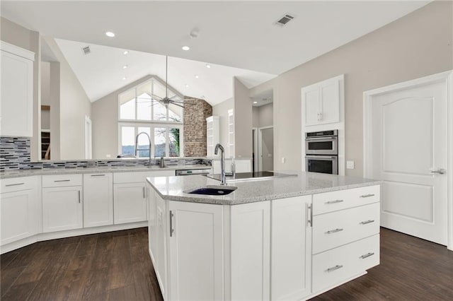 2150 Fincher Rd, Canton, GA 30114 - kitchen with white cabinetry, visible vents, double oven, and dark wood-style floors