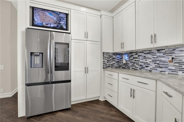 2150 Fincher Rd, Canton, GA 30114 - kitchen with stainless steel fridge with ice dispenser, decorative backsplash, white cabinets, and dark wood-style floors
