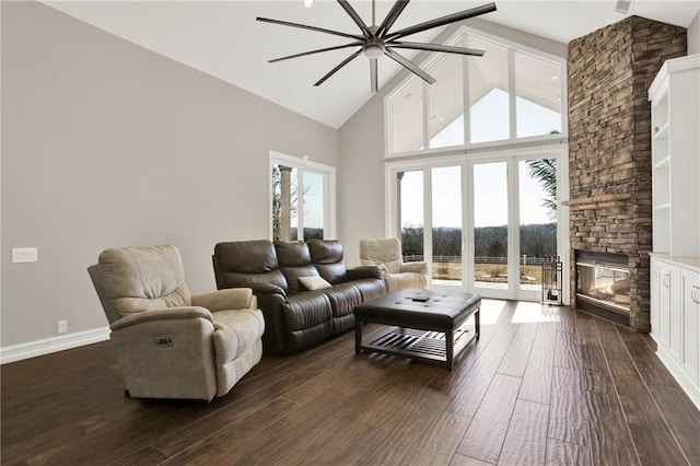 2150 Fincher Rd, Canton, GA 30114 - living room with baseboards, a fireplace, dark wood-type flooring, ceiling fan, and high vaulted ceiling