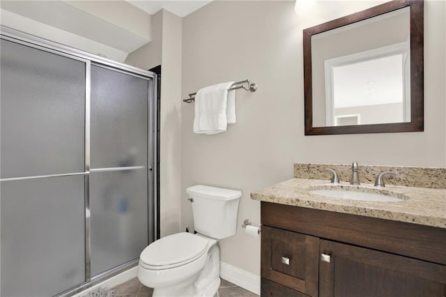 2150 Fincher Rd, Canton, GA 30114 - full bathroom featuring vanity, baseboards, a stall shower, tile patterned floors, and toilet