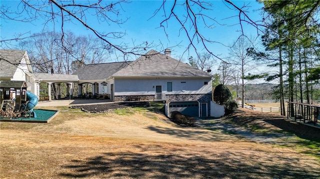 2150 Fincher Rd, Canton, GA 30114 - back of property with stone siding and fence