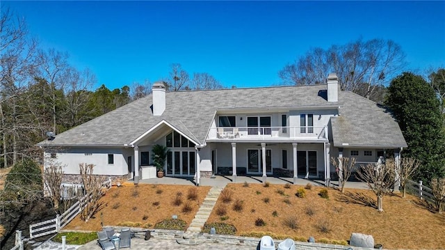 2150 Fincher Rd, Canton, GA 30114 - back of house with a patio area, a balcony, fence, and a chimney