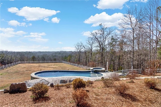 2150 Fincher Rd, Canton, GA 30114 - view of swimming pool with a pool with connected hot tub, a forest view, and fence