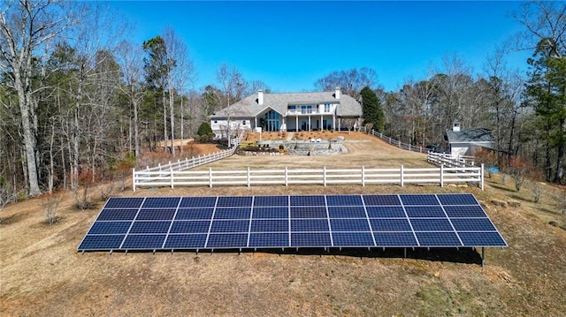 2150 Fincher Rd, Canton, GA 30114 - back of property featuring ground mounted solar panels and fence