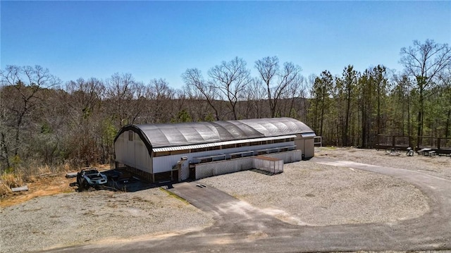 2150 Fincher Rd, Canton, GA 30114 - view of front of property with an outbuilding and a forest view