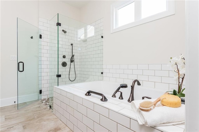 bathroom with independent shower and bath