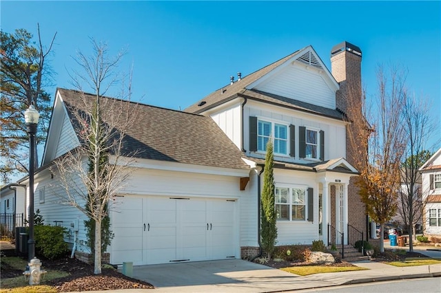 front of property with a garage