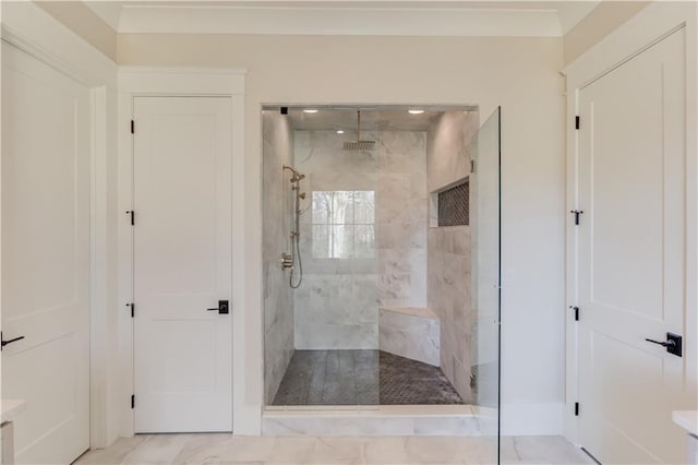 bathroom featuring a tile shower