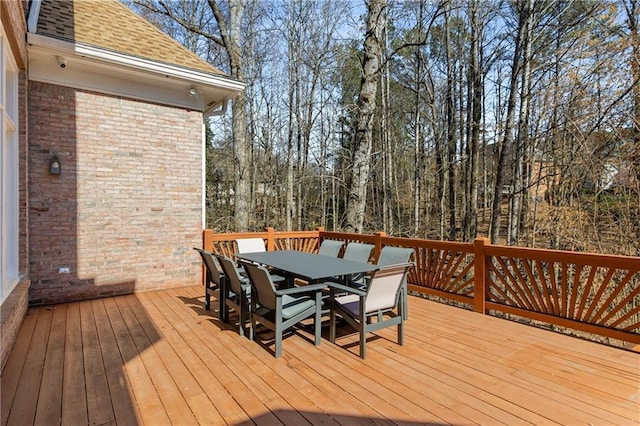 deck featuring outdoor dining area