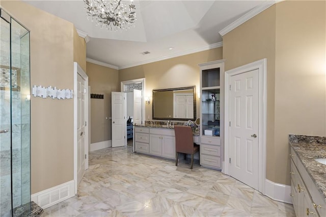 bathroom featuring baseboards, crown molding, and vanity