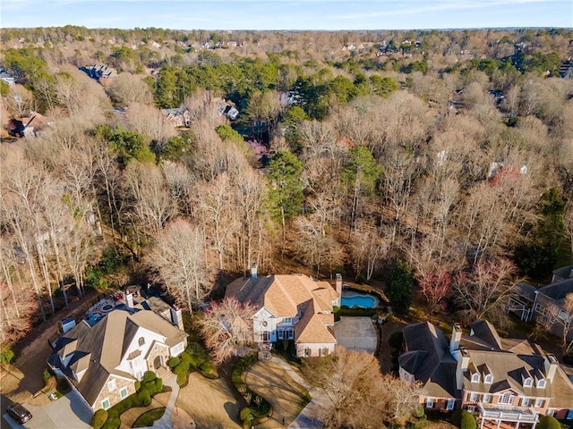 drone / aerial view with a view of trees