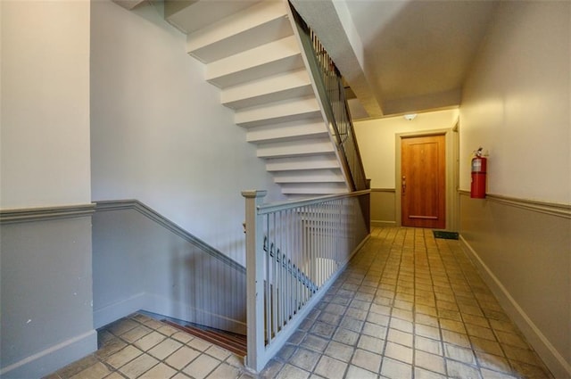 interior space featuring baseboards