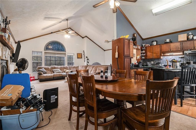 1275 Poole Bridge Rd, Hiram, GA 30141 - dining area featuring ceiling fan, lofted ceiling, light carpet, and a textured ceiling