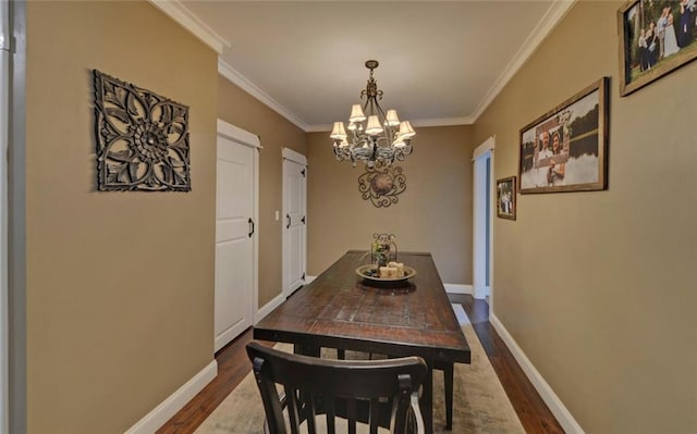 1330 Mccannon Morris Rd, Hull, GA 30646 - dining room featuring dark wood finished floors, a chandelier, and crown molding