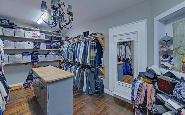 1330 Mccannon Morris Rd, Hull, GA 30646 - walk in closet with dark wood-type flooring and a chandelier