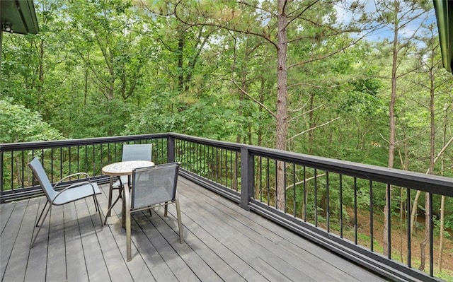1330 Mccannon Morris Rd, Hull, GA 30646 - deck with outdoor dining area and a view of trees