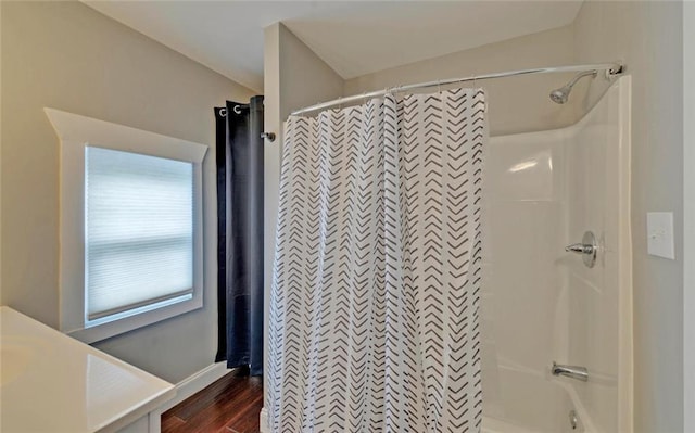 1330 Mccannon Morris Rd, Hull, GA 30646 - bathroom with wood finished floors, vanity, and shower / bathtub combination with curtain