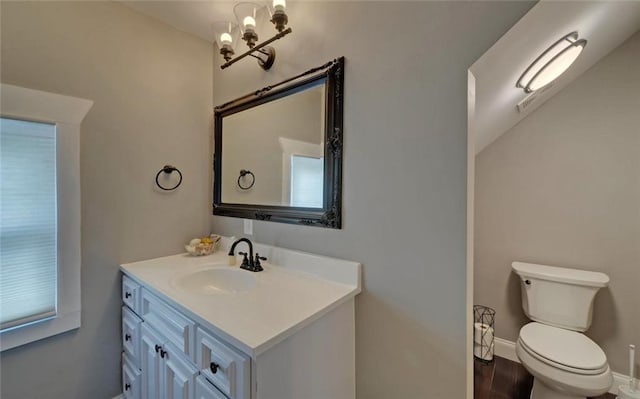1330 Mccannon Morris Rd, Hull, GA 30646 - half bath featuring vanity, a chandelier, and wood finished floors