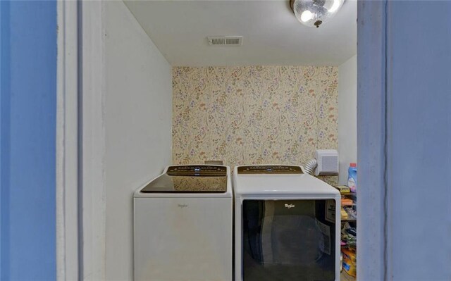 1330 Mccannon Morris Rd, Hull, GA 30646 - laundry area featuring washer and clothes dryer and wallpapered walls