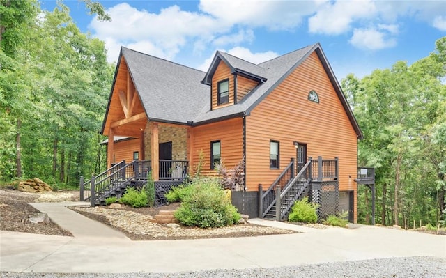 1330 Mccannon Morris Rd, Hull, GA 30646 - chalet / cabin featuring stairs, a porch, driveway, a garage, and stone siding