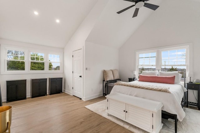212 Haralson Ave NE, Atlanta, GA 30307 - bedroom featuring high vaulted ceiling, multiple windows, light wood-type flooring, recessed lighting, and baseboards