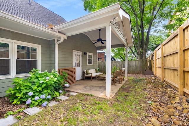212 Haralson Ave NE, Atlanta, GA 30307 - fenced backyard featuring a ceiling fan and a patio area