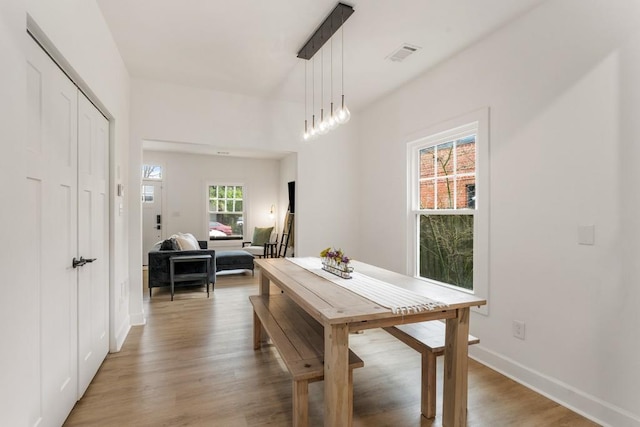 212 Haralson Ave NE, Atlanta, GA 30307 - dining area featuring light wood finished floors and baseboards