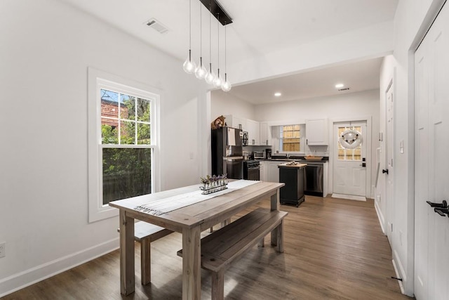 212 Haralson Ave NE, Atlanta, GA 30307 - dining area featuring dark wood finished floors, baseboards, and recessed lighting