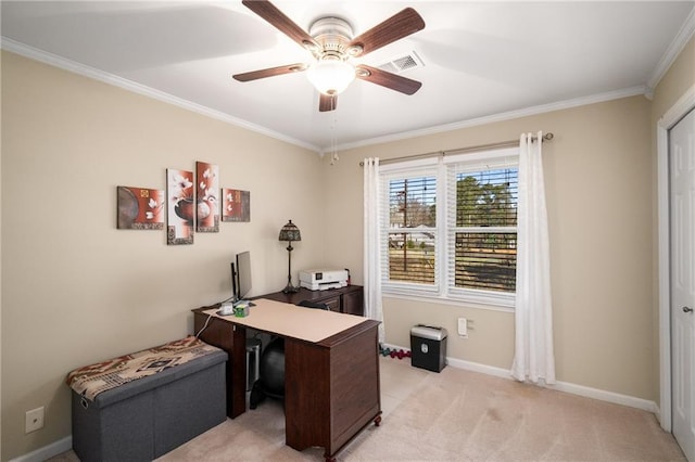 office featuring visible vents, baseboards, ornamental molding, light carpet, and a ceiling fan