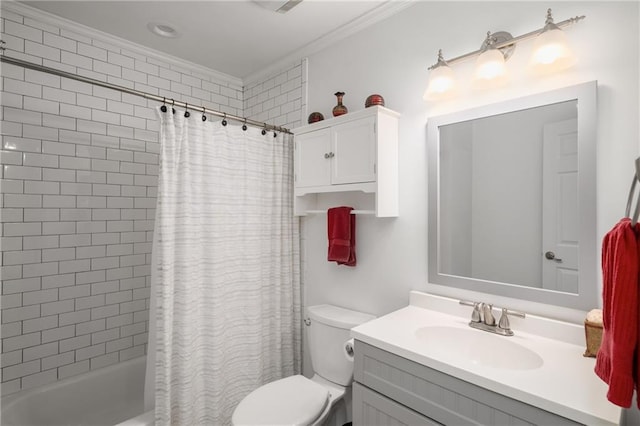 full bath featuring vanity, crown molding, shower / tub combo, and toilet