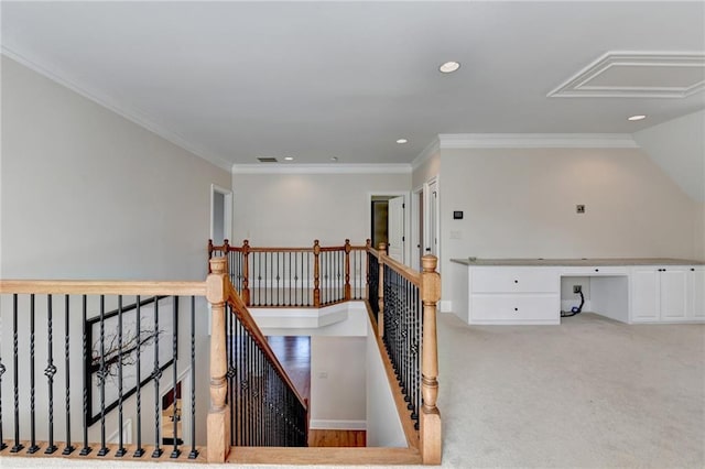 1054 Morgan Garner Dr SW, Lilburn, GA 30047 - stairway featuring attic access, recessed lighting, carpet floors, built in desk, and ornamental molding