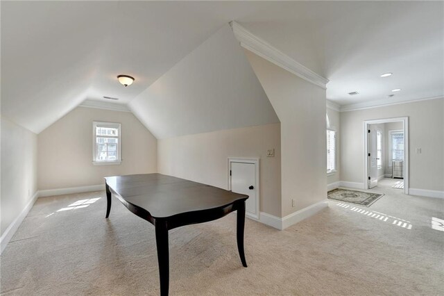 1054 Morgan Garner Dr SW, Lilburn, GA 30047 - bonus room featuring light carpet, baseboards, and vaulted ceiling