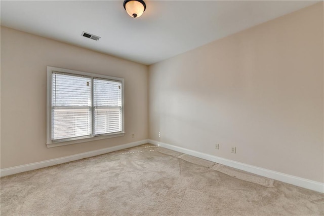 1054 Morgan Garner Dr SW, Lilburn, GA 30047 - carpeted empty room with baseboards