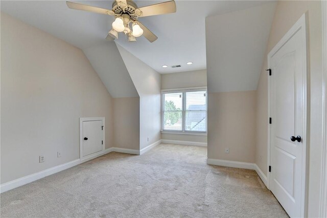 1054 Morgan Garner Dr SW, Lilburn, GA 30047 - bonus room with carpet floors, vaulted ceiling, baseboards, and ceiling fan