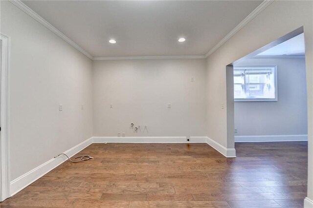 1054 Morgan Garner Dr SW, Lilburn, GA 30047 - spare room with ornamental molding, wood finished floors, baseboards, and recessed lighting