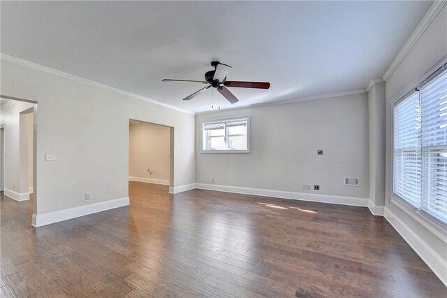 1054 Morgan Garner Dr SW, Lilburn, GA 30047 - unfurnished room with ceiling fan, dark wood-style flooring, ornamental molding, and baseboards