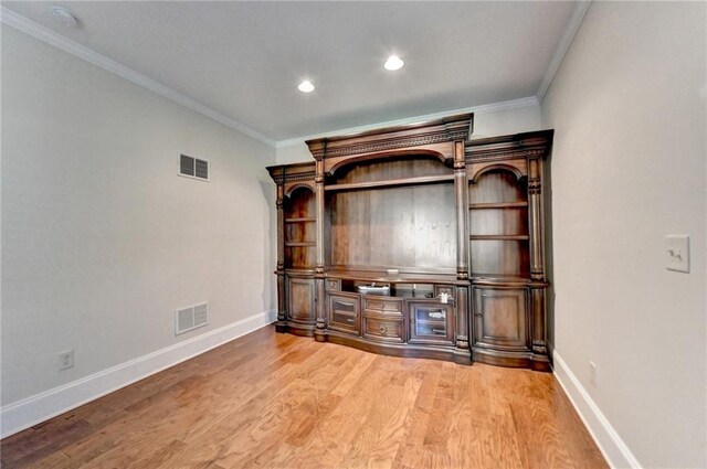 1054 Morgan Garner Dr SW, Lilburn, GA 30047 - unfurnished living room featuring baseboards, wood finished floors, ornamental molding, and recessed lighting