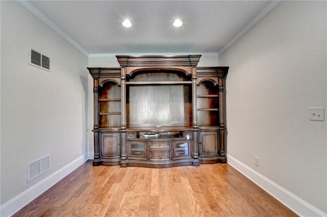 1054 Morgan Garner Dr SW, Lilburn, GA 30047 - unfurnished living room with baseboards, wood finished floors, crown molding, and recessed lighting