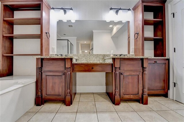 1054 Morgan Garner Dr SW, Lilburn, GA 30047 - bathroom featuring tile patterned floors, a bath, and vanity