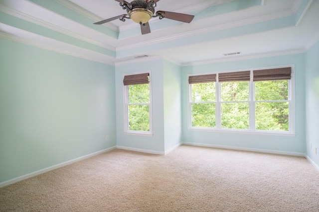 5746 Nix Bridge Rd, Gainesville, GA 30506 - carpeted empty room featuring a raised ceiling, ornamental molding, baseboards, and ceiling fan