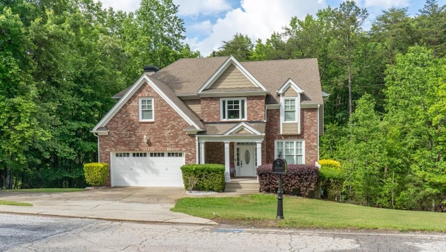 5746 Nix Bridge Rd, Gainesville, GA 30506 - view of front of home with an attached garage, concrete driveway, brick siding, a front yard, and a chimney