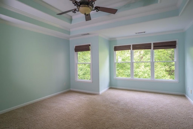 5746 Nix Bridge Rd, Gainesville, GA 30506 - carpeted empty room featuring a tray ceiling, crown molding, baseboards, and a ceiling fan
