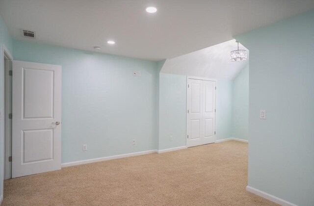 5746 Nix Bridge Rd, Gainesville, GA 30506 - spare room featuring light colored carpet, baseboards, recessed lighting, and a chandelier
