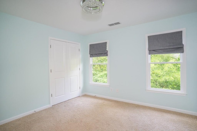 5746 Nix Bridge Rd, Gainesville, GA 30506 - unfurnished bedroom with carpet floors, baseboards, and a closet