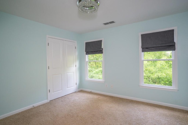 5746 Nix Bridge Rd, Gainesville, GA 30506 - unfurnished bedroom featuring carpet floors, baseboards, and a closet