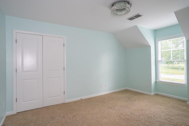 5746 Nix Bridge Rd, Gainesville, GA 30506 - additional living space with carpet floors, baseboards, and lofted ceiling