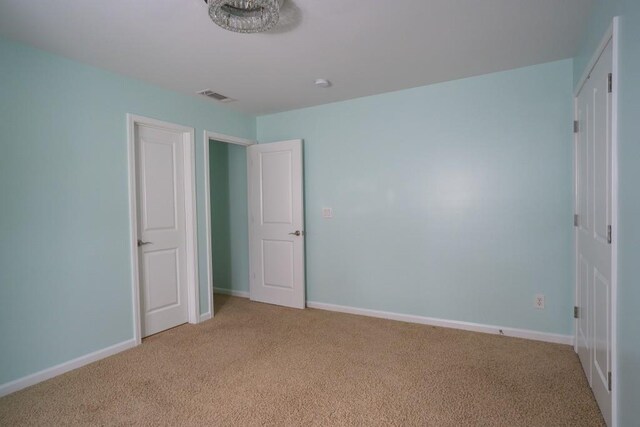 5746 Nix Bridge Rd, Gainesville, GA 30506 - unfurnished bedroom with light colored carpet and baseboards